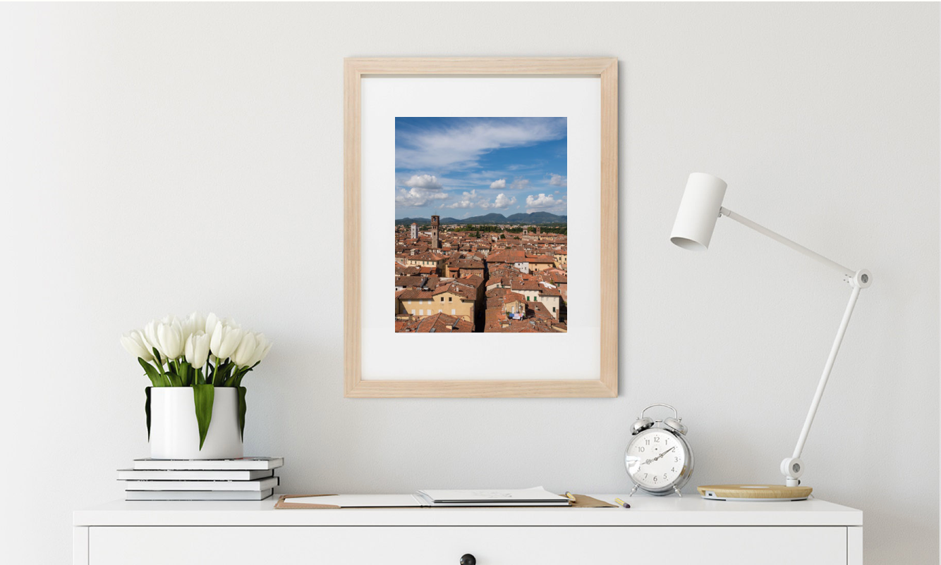 A photograph of Lucca, Italy by Leah Ramuglia is framed as Wall Art